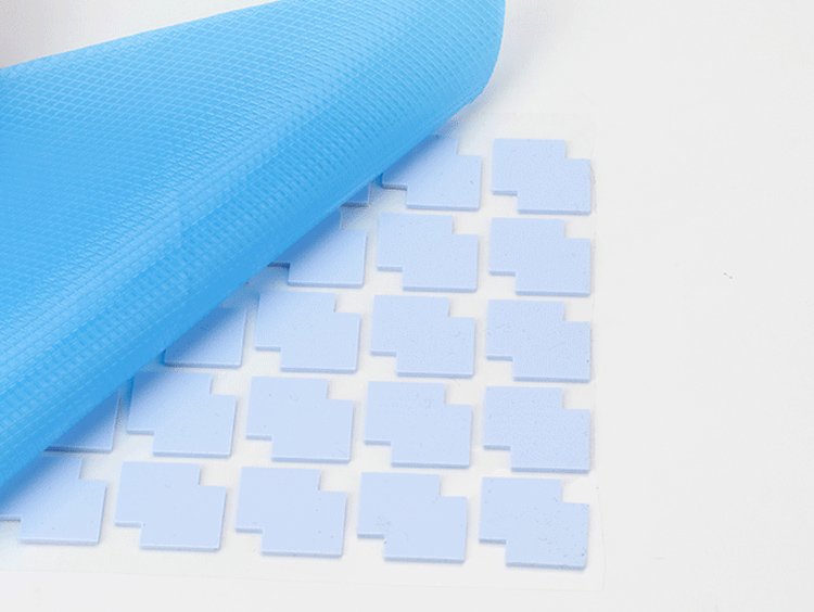 Thermal pad adhesive backed