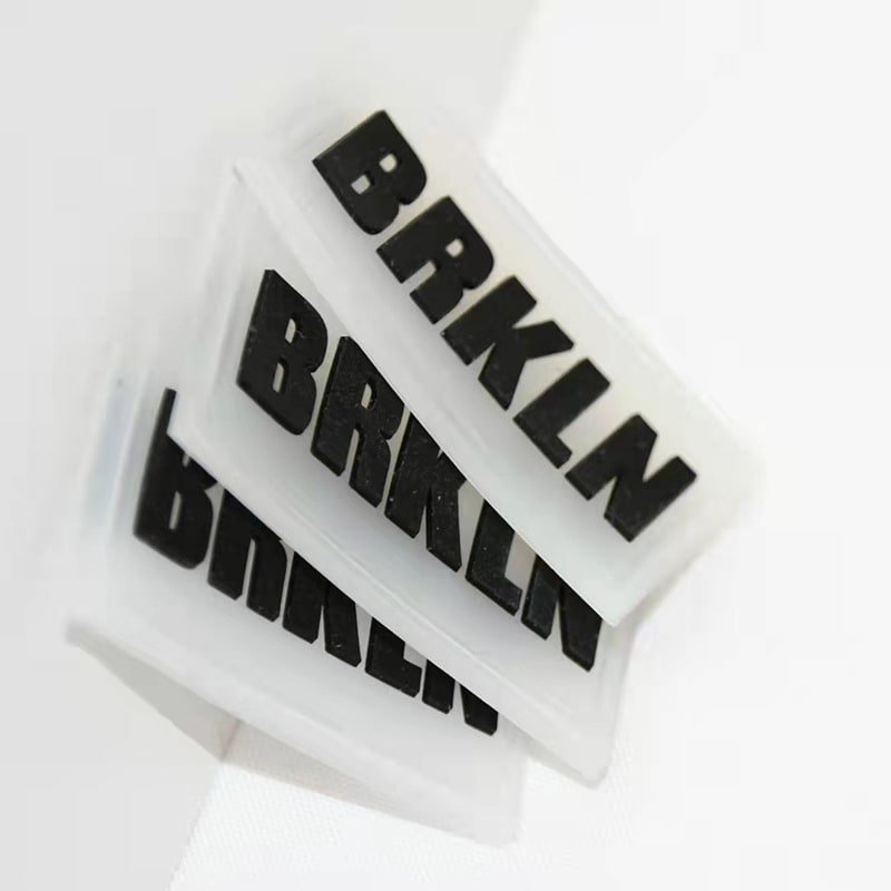 Precision molded silicone label samples with clean raised letters