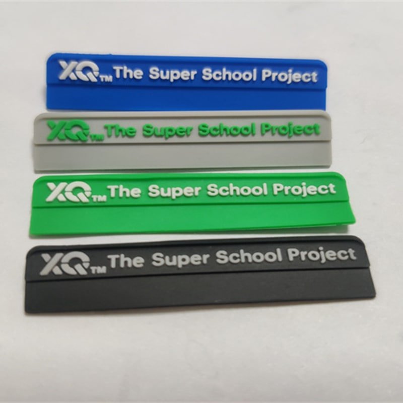 Color bar silicone label samples showing multiple molded brand label options