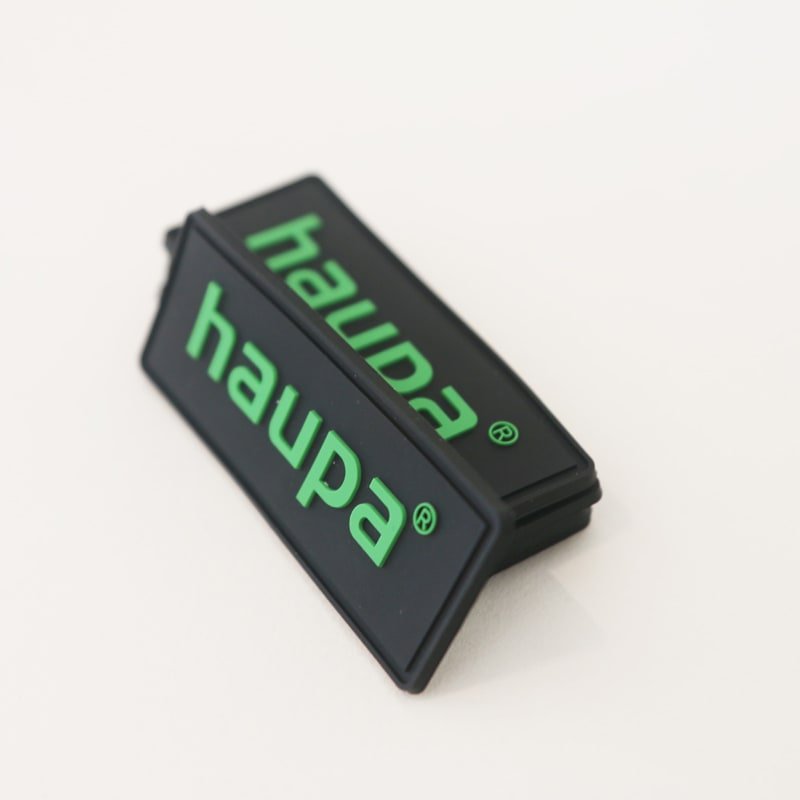 Custom silicone label samples for apparel, bags, and branded products
