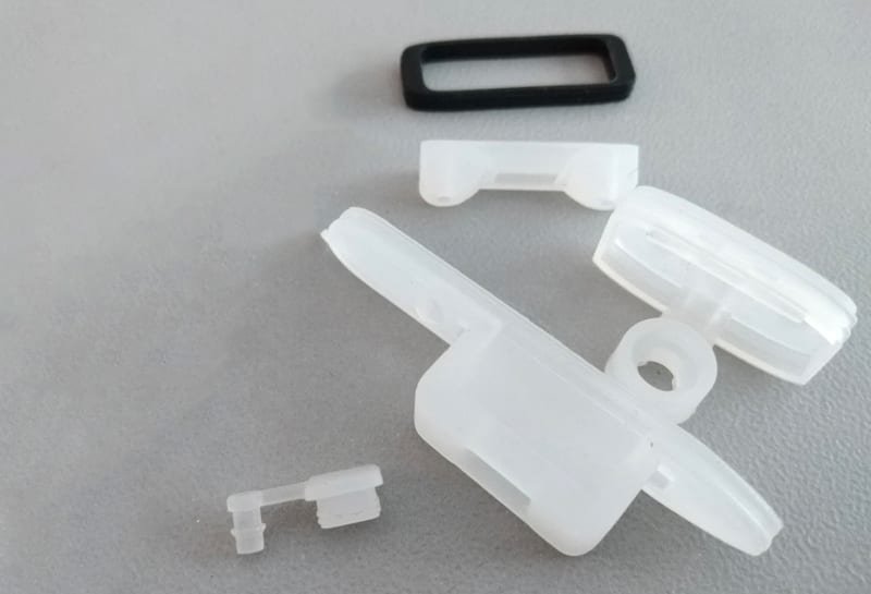 LSR overmolded sealing components