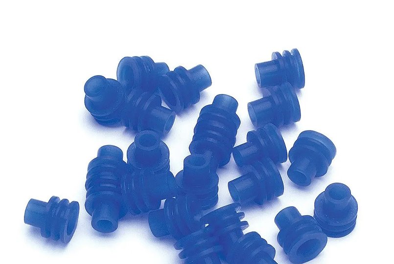 Custom silicone wire seal grommets in blue silicone